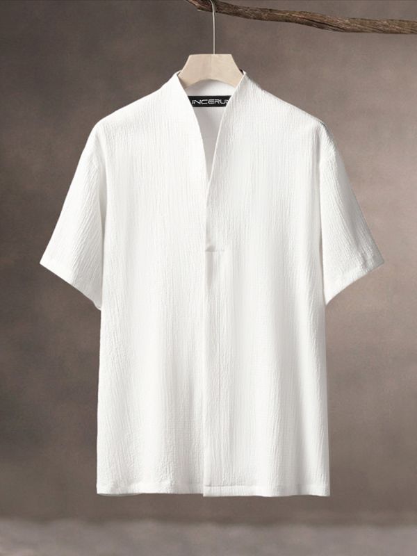 Men's Retro Beach Vacation Crinkle Textured Back Pleat Drop Shoulder Short Sleeve V-Neck Shirt SKUL85134